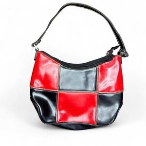 Red and black patchwork faux leather shoulder bag. Zipper is broken